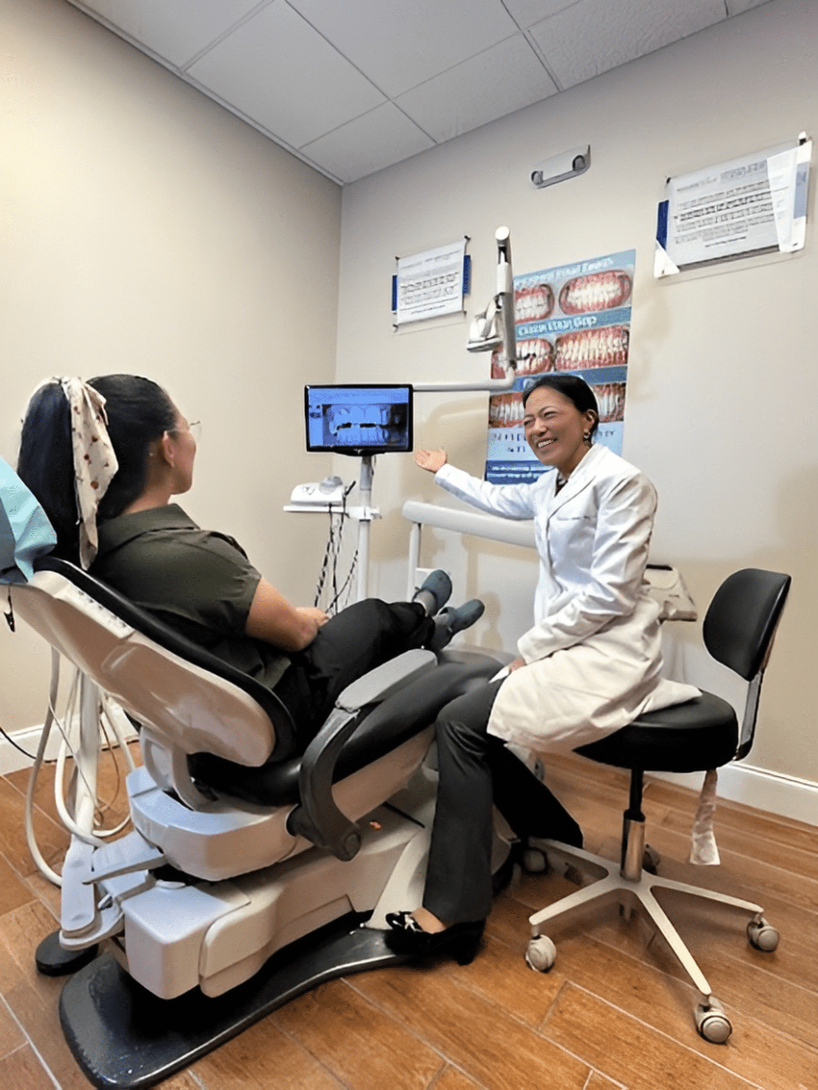 Dr. Charmaine Johnson showing screen to patient