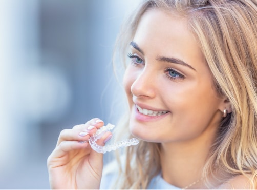 Patient Using Invisalign Aligners to Achieve a Straighter Smile