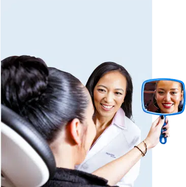 Dr. Charmaine Johnson with a Patient Reviewing their Dental Results