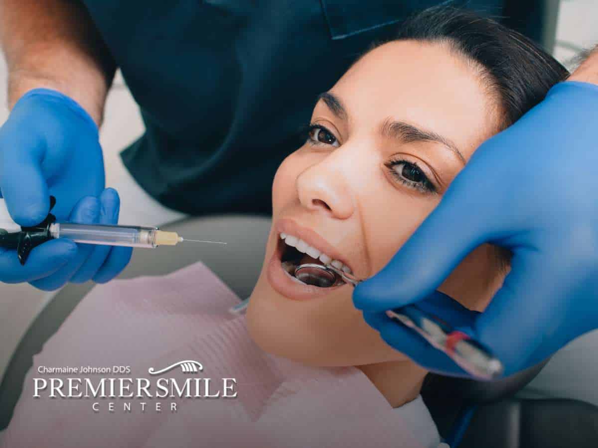 Patient receiving treatment at dentist's office for Cosmetic Dentistry procedure