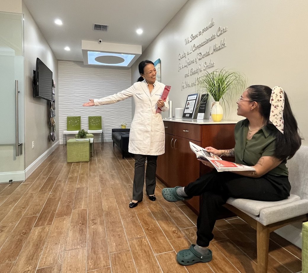 The welcoming reception and waiting area at Premier Smile Center in Fort Lauderdale